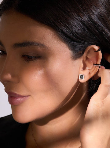 A pair of Earrings - Black Enamel with diamonds