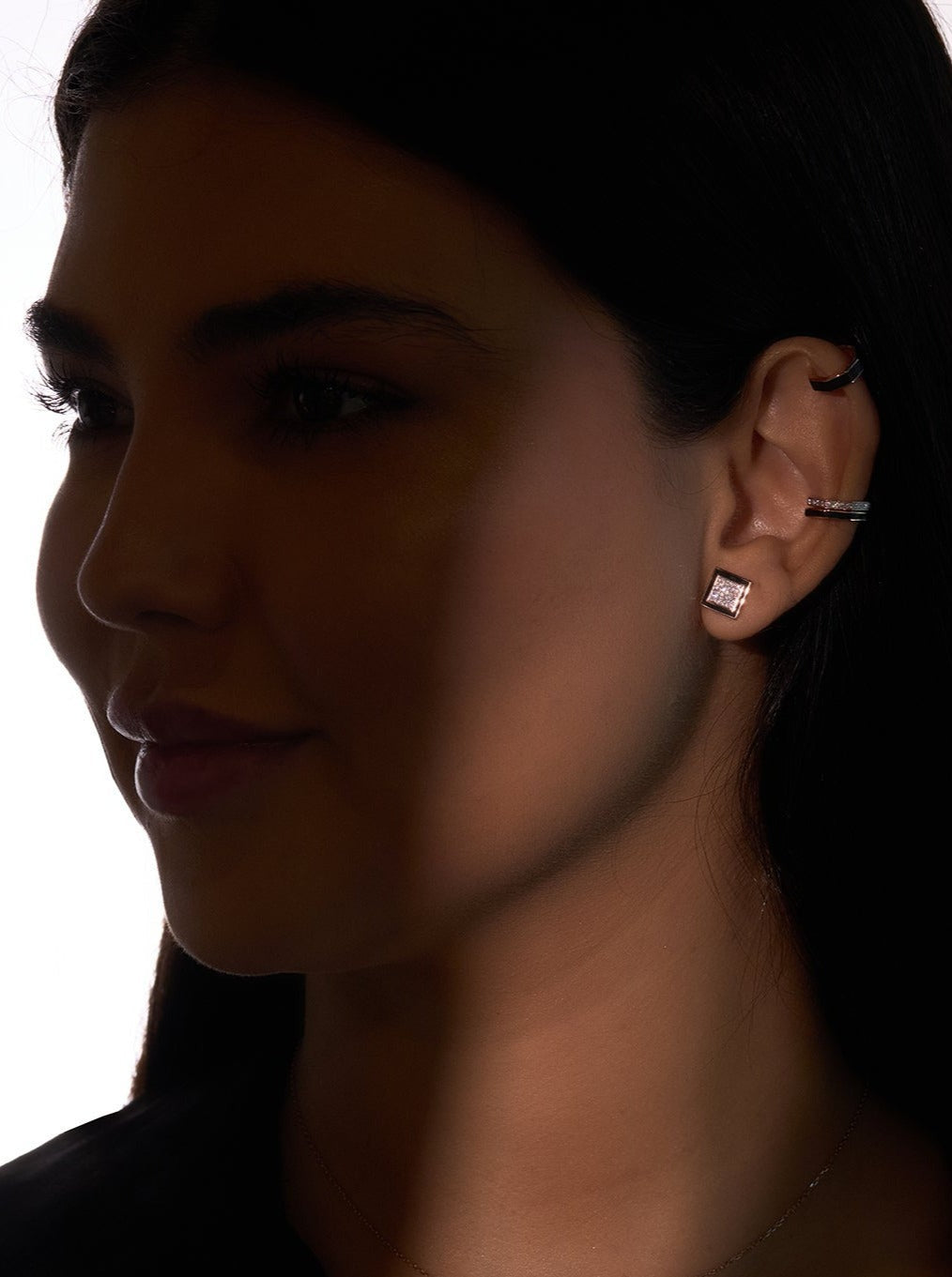 A pair of Earrings - Black Enamel with diamonds