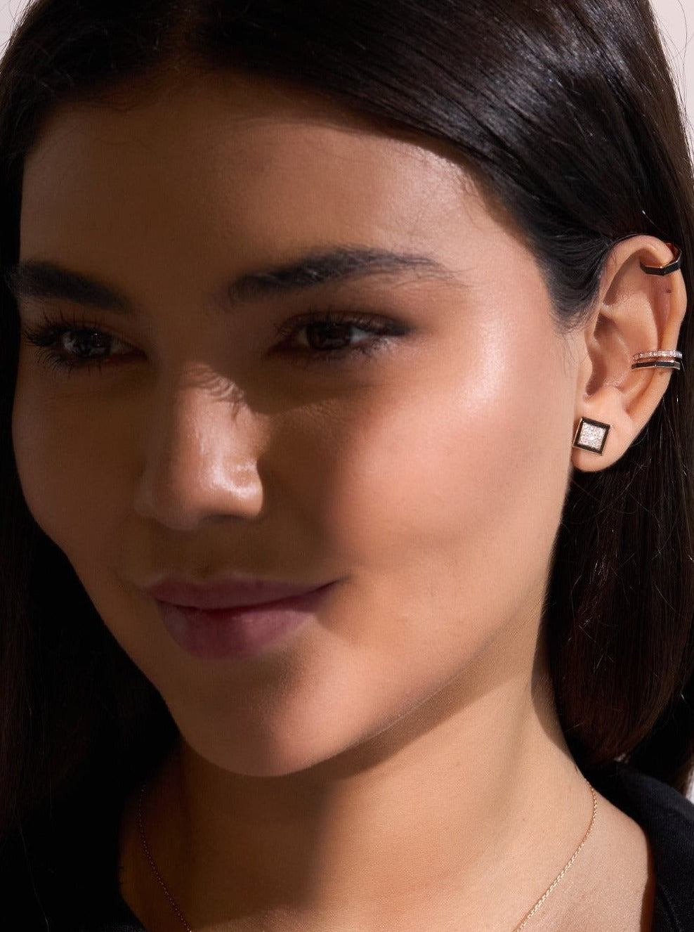 A pair of Earrings - Black Enamel with diamonds